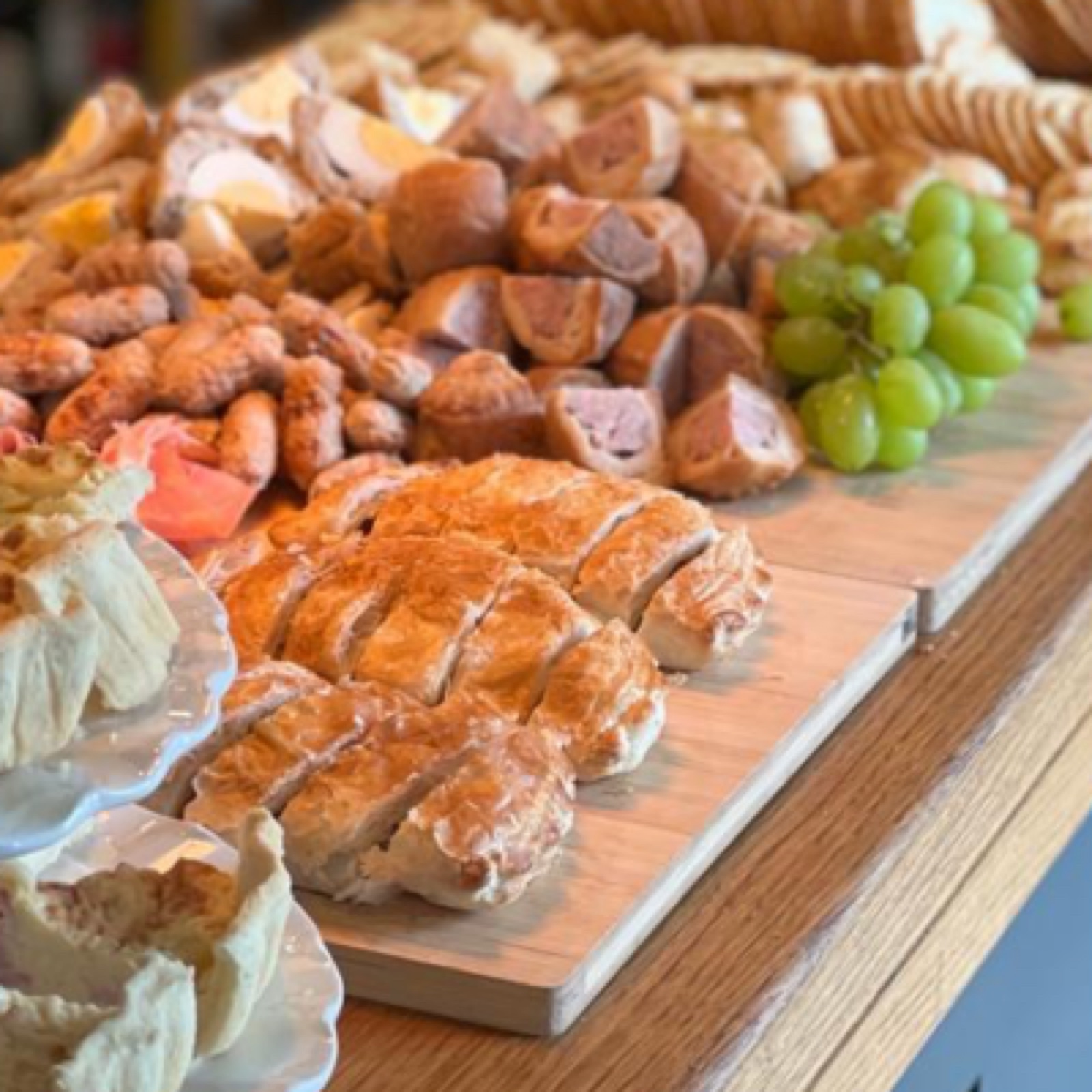 A generous charity cheeseboard at the Refreshment Rooms — a selection of local cheeses and savoury accompaniments